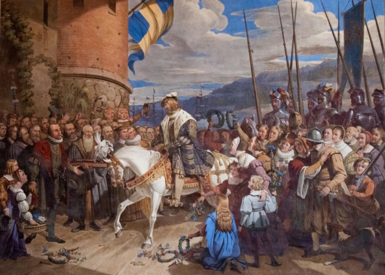 Målning föreställandes 1500-talskung på häst som välkomnas utanför stadsport