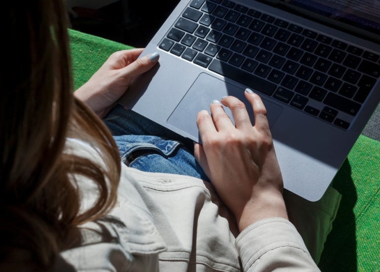 A student with a laptop.