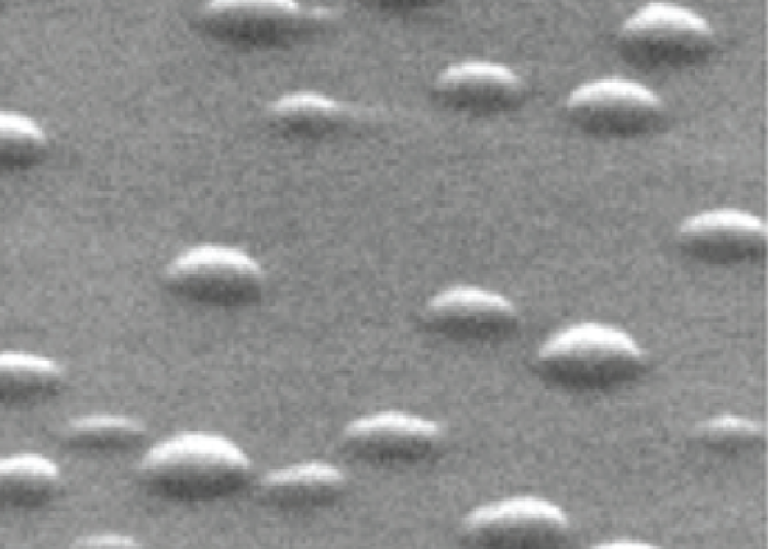 Bild från svepelektronmikroskop av ytan på ett prov av en kvantprick