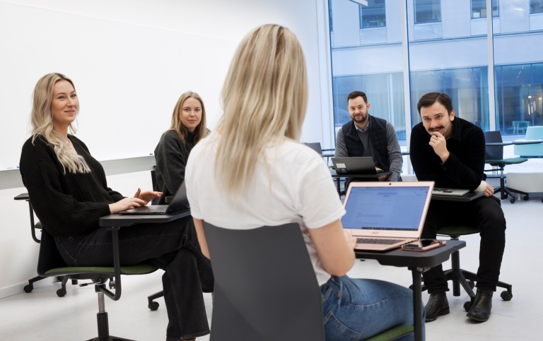 A group of students and a computer