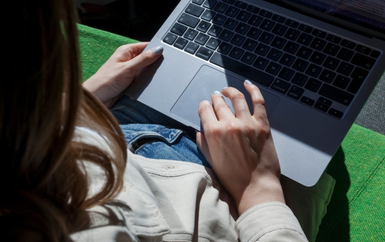 Student with laptop.