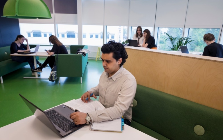 Student in front of his computer.