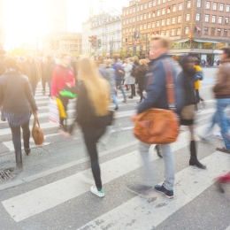 Blurry crowd crossing street