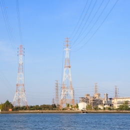 Thermal power plant by the water.