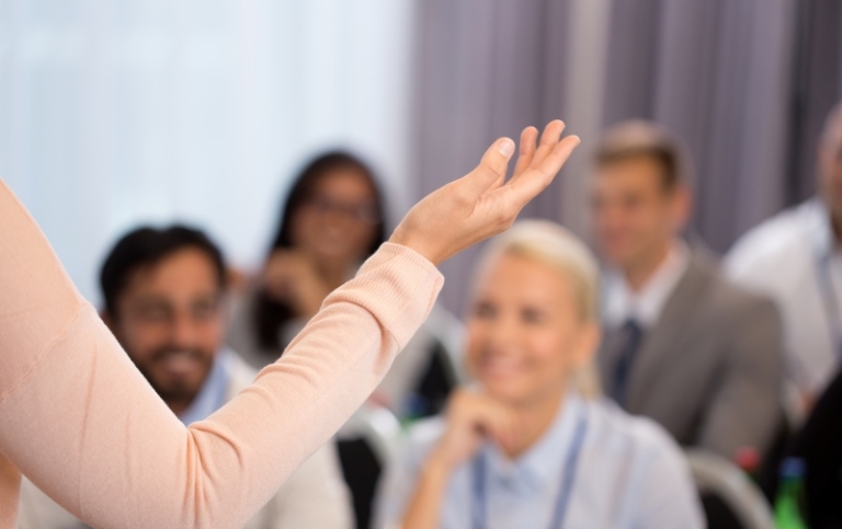 group of people at business conference or lecture