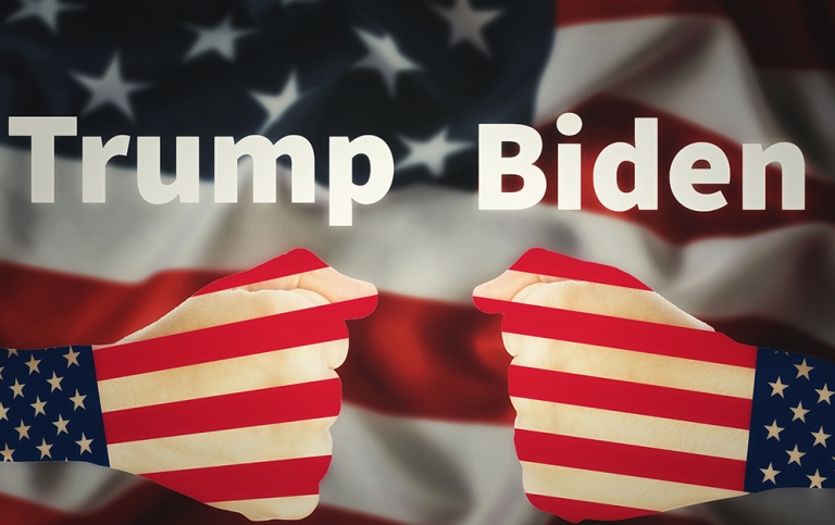 Amerikanska flaggan i form av två knytnävar mot varandra, Text Trump Biden
