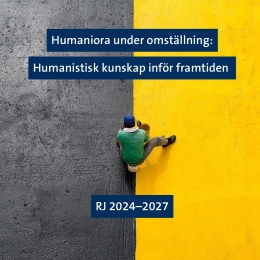 halva bilden är grå, halva är gul. Person syns uppifrån på färggränsen som målar.