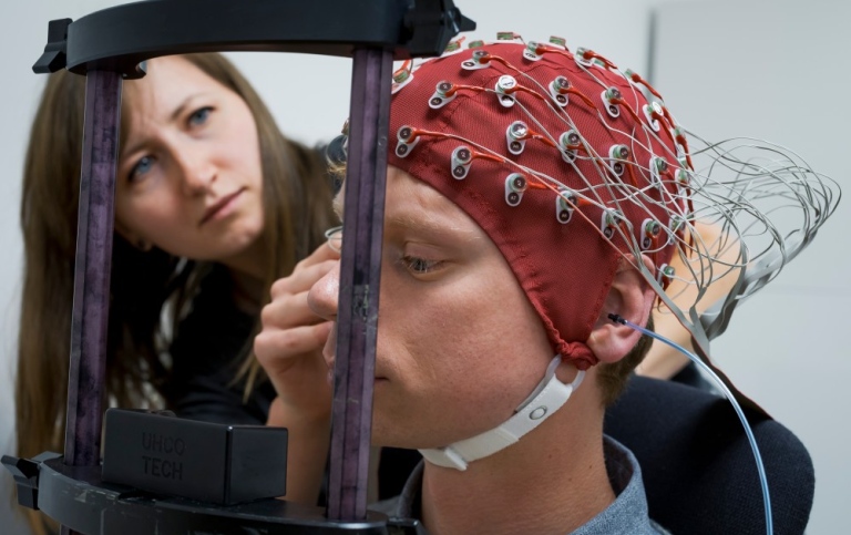 The participant is about to do an experiment that measures the brain responses to auditory stimuli. 
