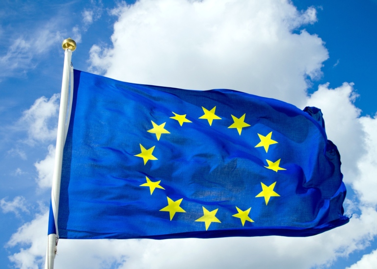 Blå flagga med gula stjärnor