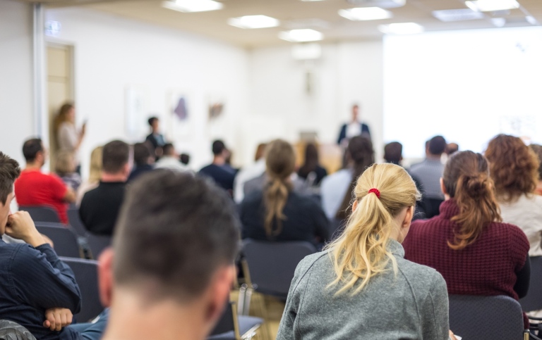 Students in a lecture hall.