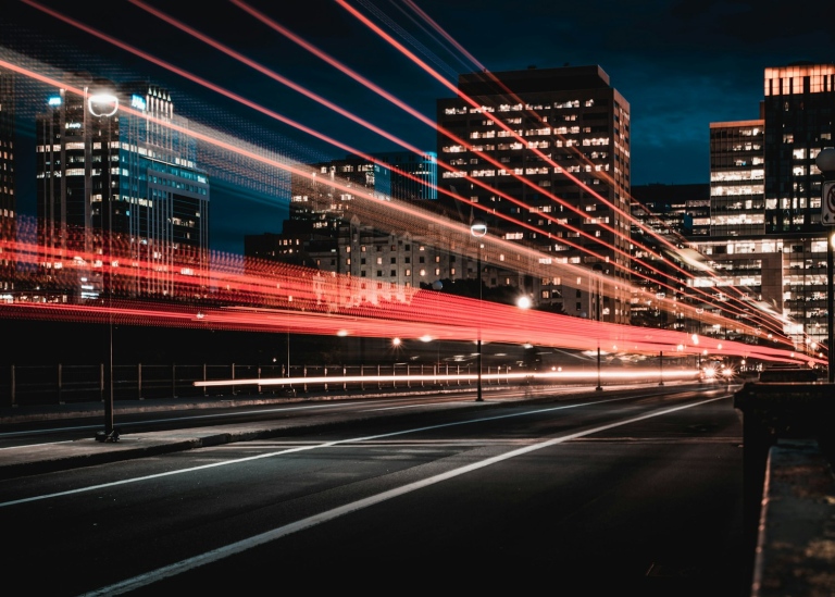 long exposure photograph of road and cars at night