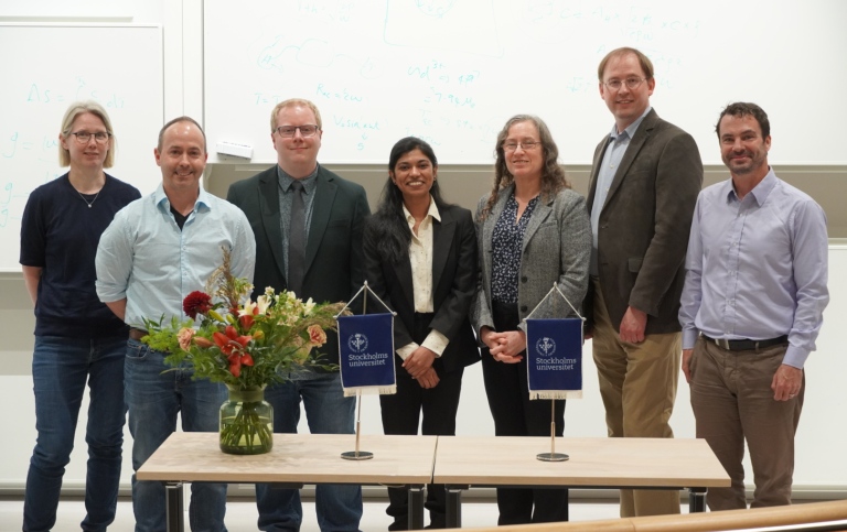 Neha Kondedan and the Examination Committee at the defense on June 4, 2025.