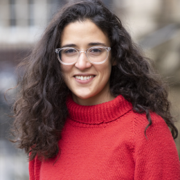 Veronica Salazar-Restrepo wearing a red turtleneck sweater