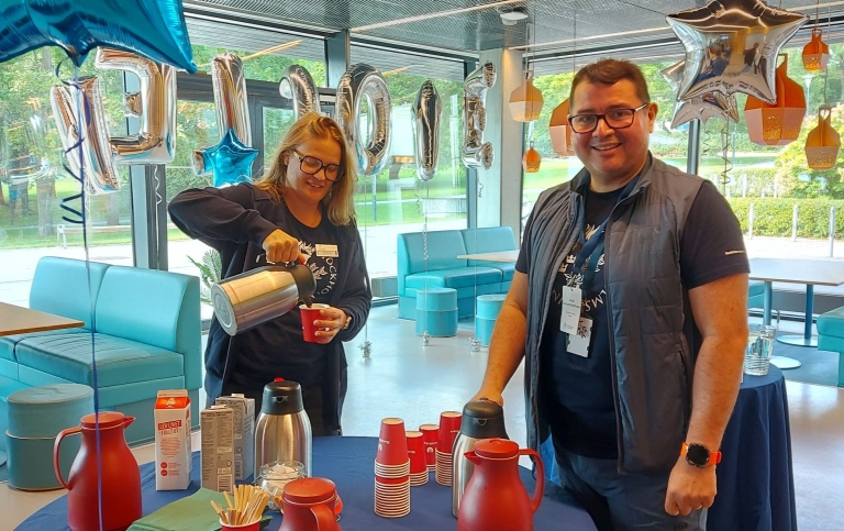 International coordinators Hanna and Pablo preparing Swedish fika.