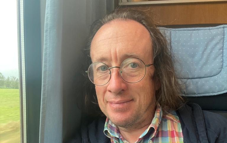 Alasdair Skelton on the train