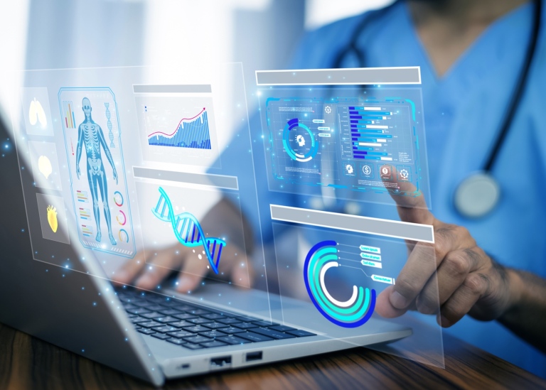Doctors analyze digital health data on laptop