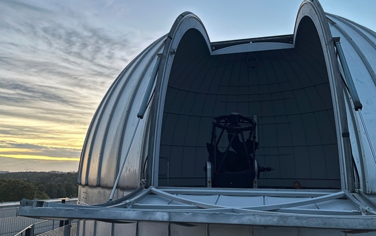The new telescope at dawn in the AlbaNova dome.