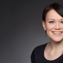 Ulrike Schimpf is a woman with dark brown hair, smiling at the camera.