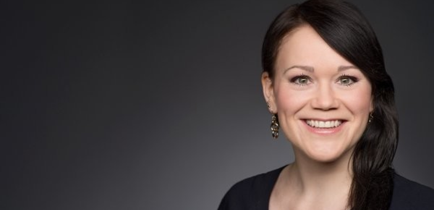 Ulrike Schimpf is a woman with dark brown hair, smiling at the camera.