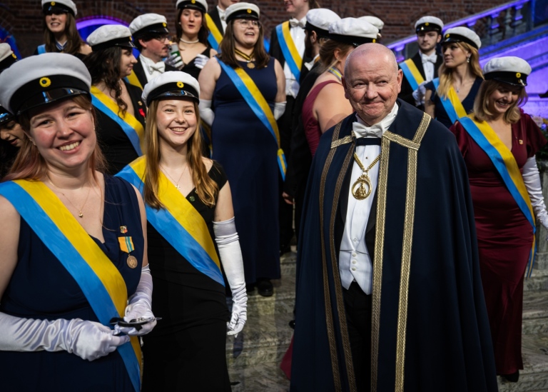 Hans Adolfsson surrounded by student marshals
