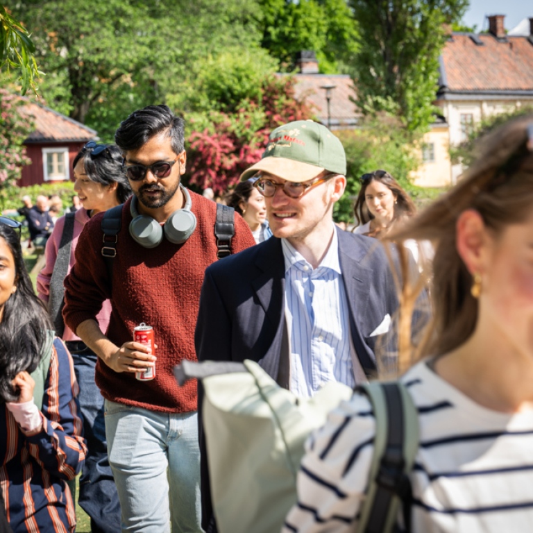 Students walking outside in the sun